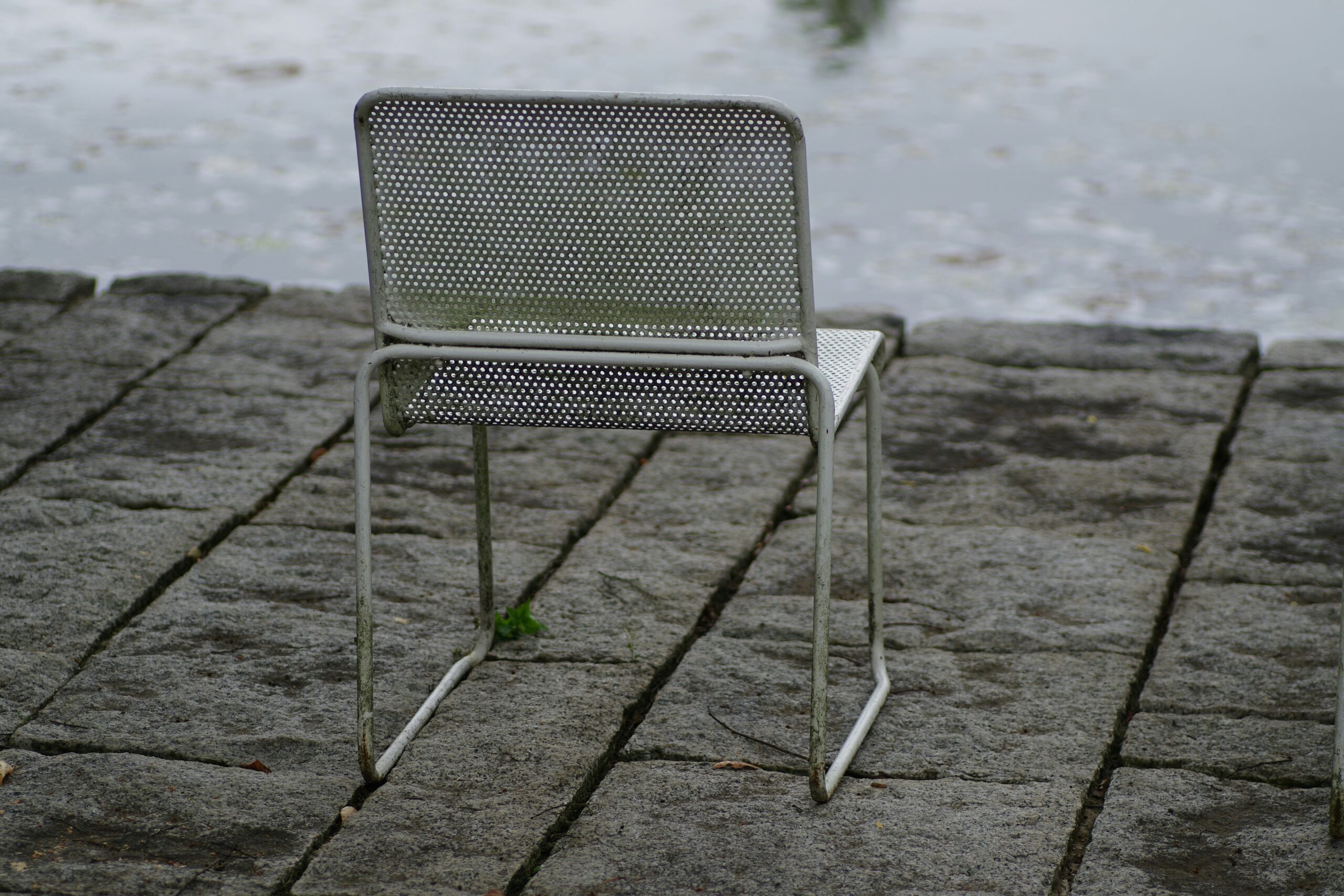 A sleek chair made from recycled plastic bottles