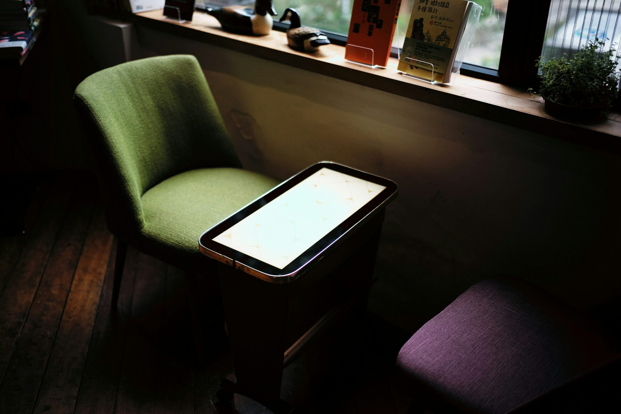 A stylish bedside lamp connected to a smartphone app