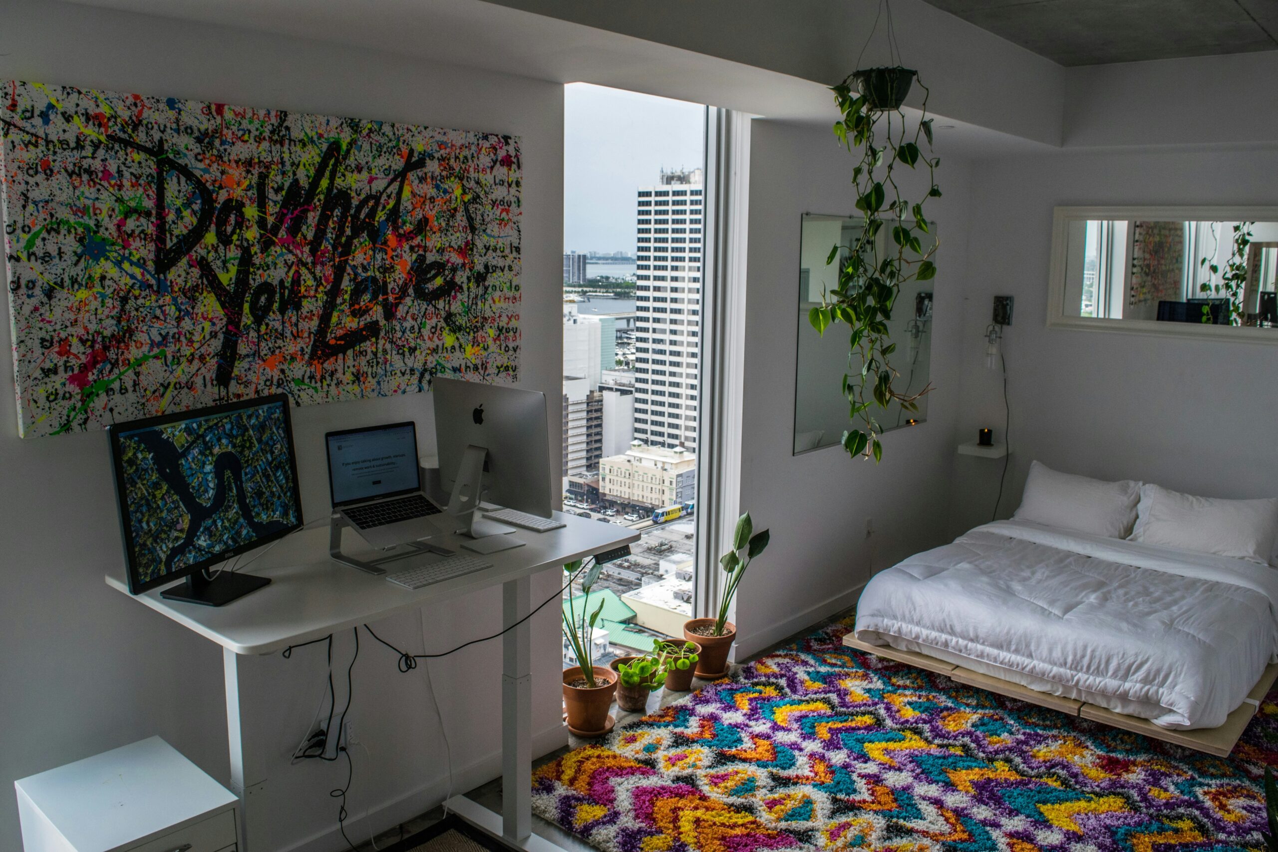 Murphy bed converted into a sleek workspace during daytime hours.