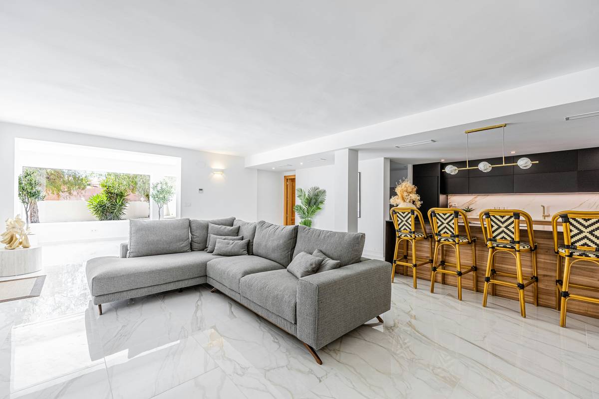 A living room with mismatched smart furniture disrupting the decor