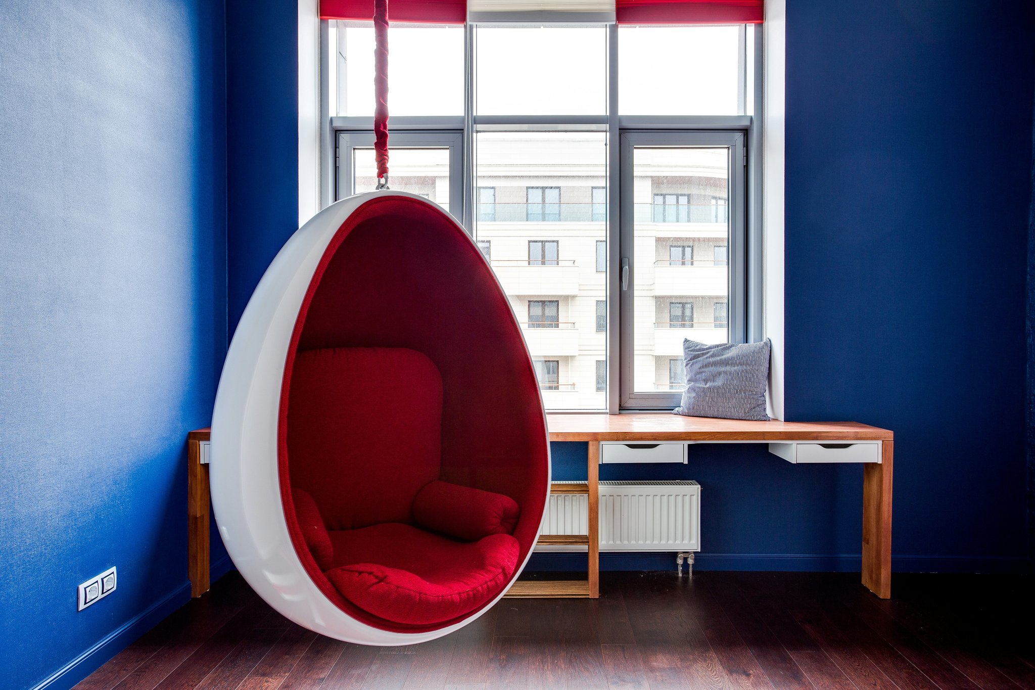 A sleek eco desk equipped with wireless charging stations and integrated LED lights